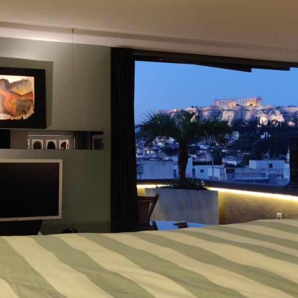 Penthouse Acropolis view from the bed in the evening